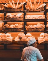 Outcome-Driven Dynamic Refugee Assignment Worker in bakery